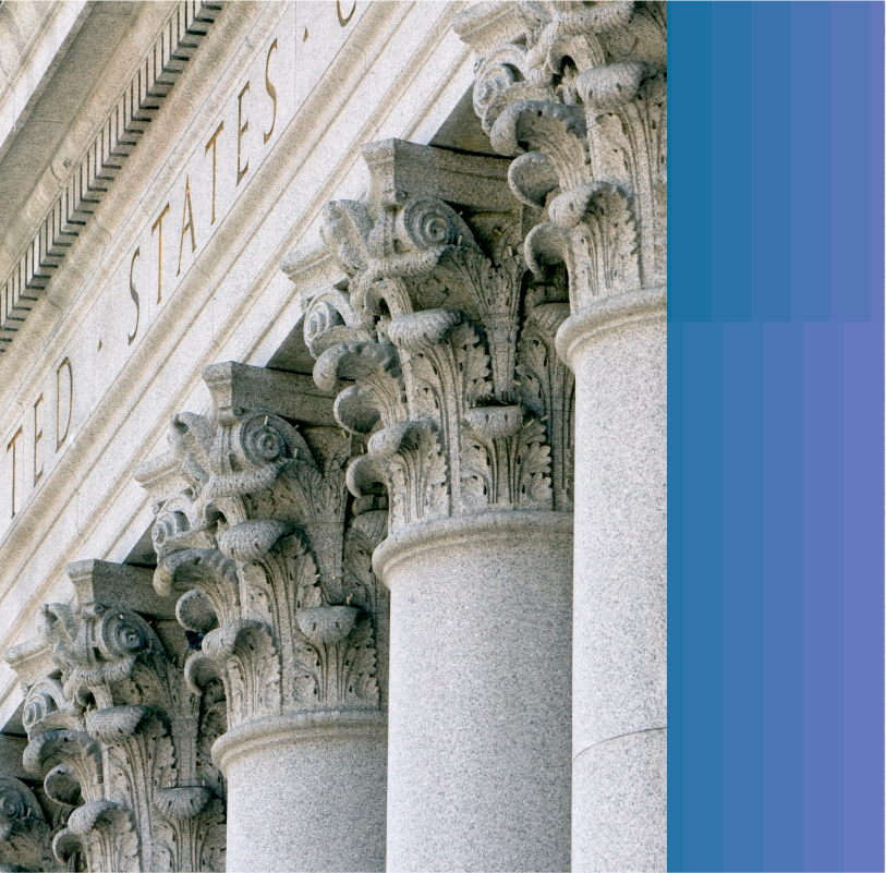 photo of a close-up shot of stone classical columns on a United States federal government building.